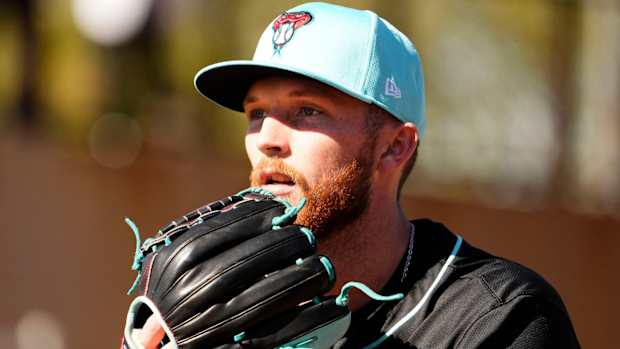 Kyle Backhus pitching during workouts at Salt River Fields
